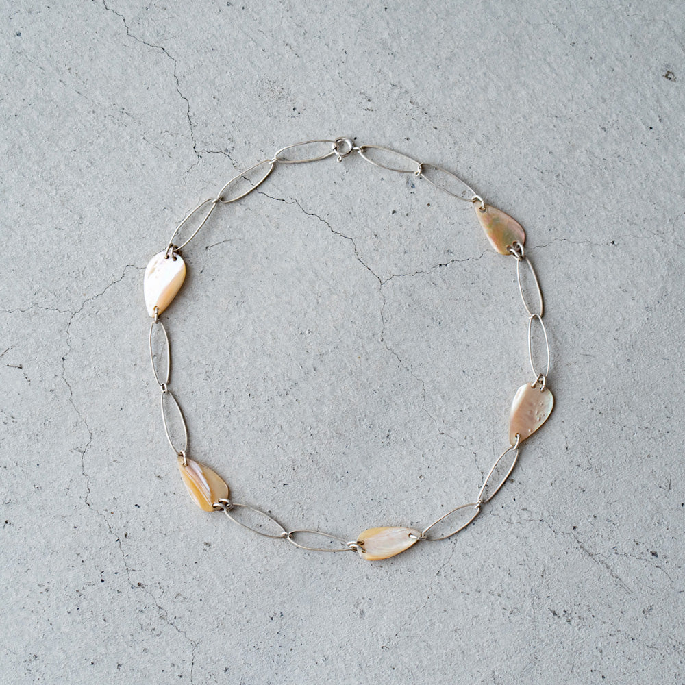 Melanie Decourcey Oval silver links with Vintage mother of pearl parts