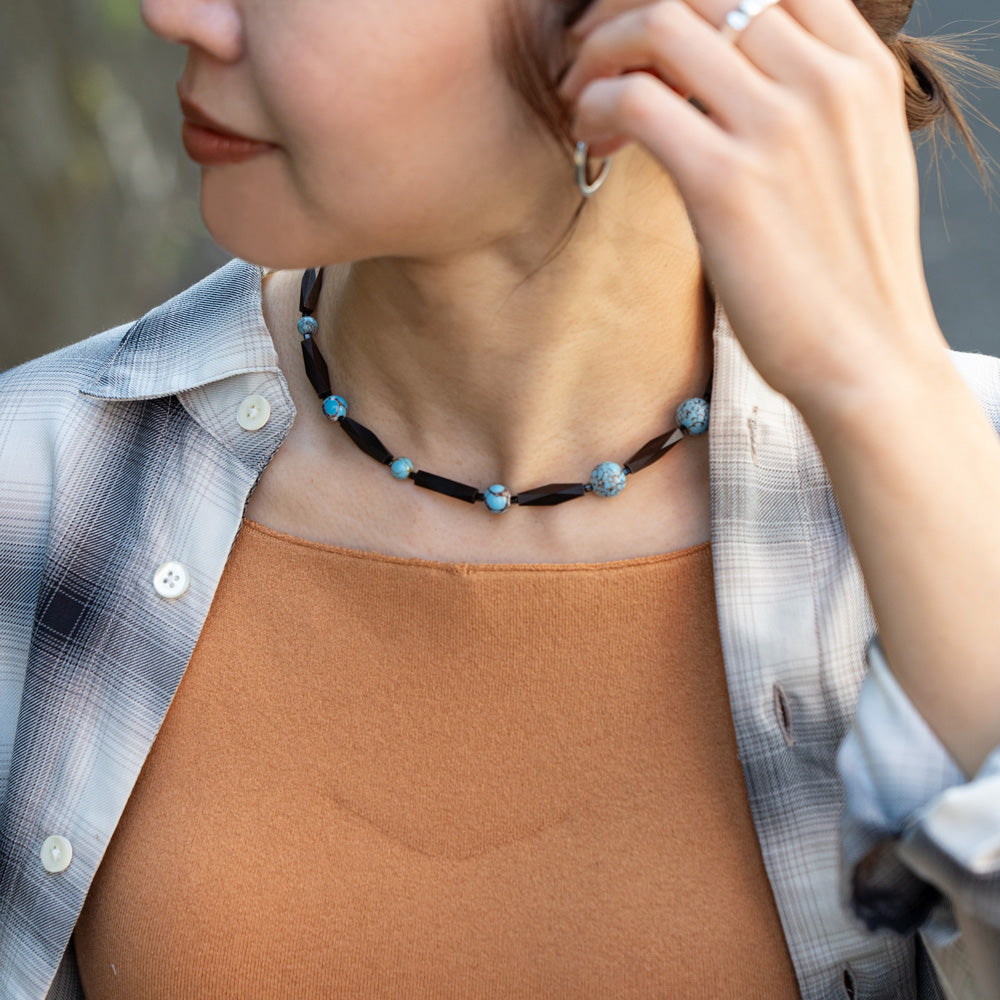Melanie Decourcey Ebony wood with blue vintage ceramic beads snd small onyx