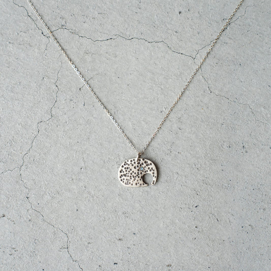 Melanie DeCourcey Elephant with small aquamarine on silver chain
