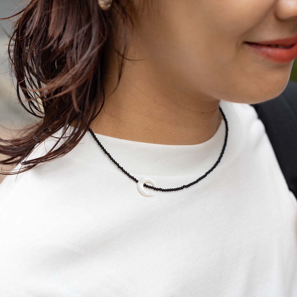 Melanie DeCourcey Small onyx with mother of pearl moon