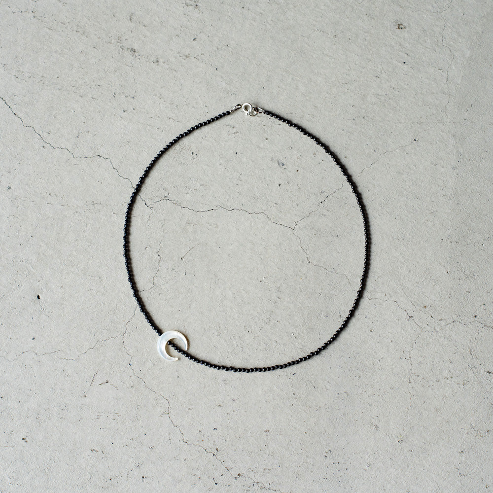 Melanie DeCourcey Small onyx with mother of pearl moon