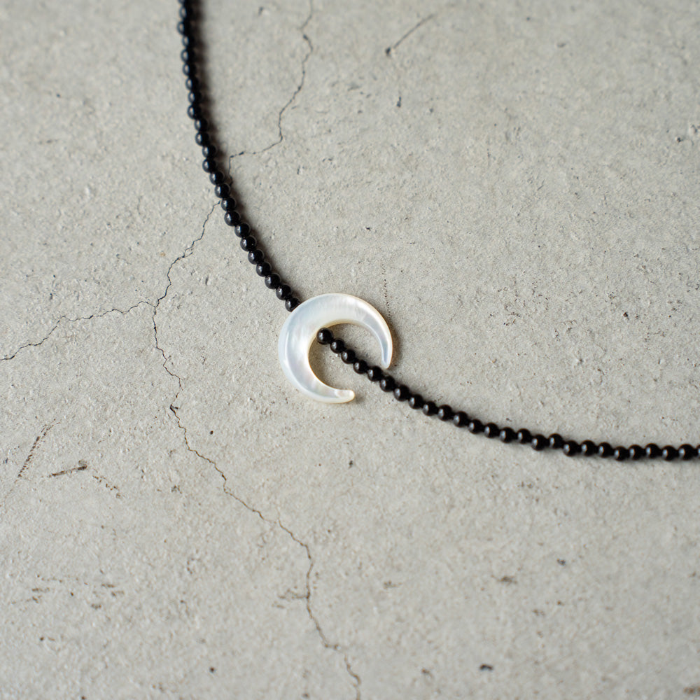 Melanie DeCourcey Small onyx with mother of pearl moon