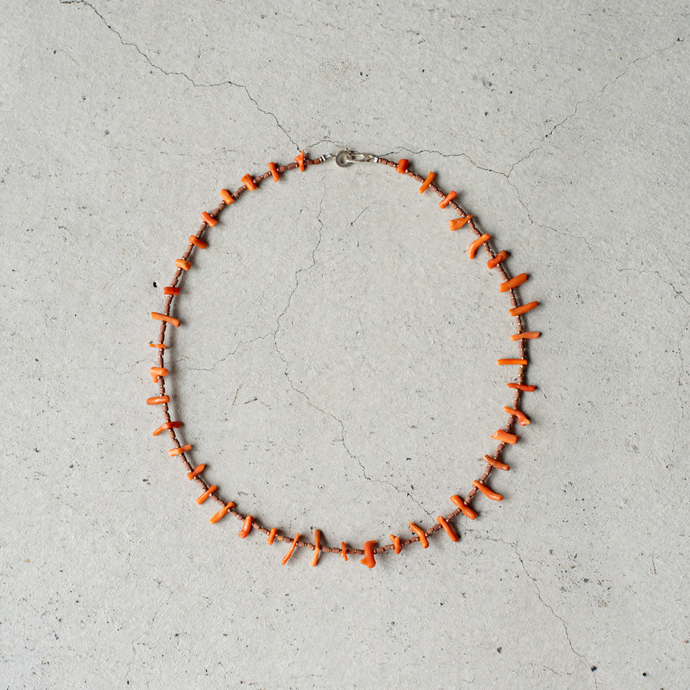 Melanie DeCourcey Beaded necklace -antique natural coral, African terracotta beads with tiny copper detail