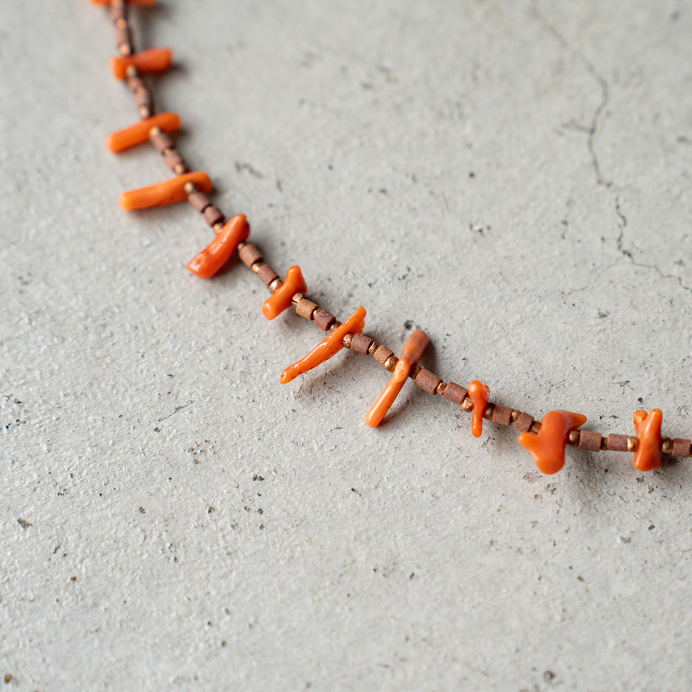 Melanie DeCourcey Beaded necklace -antique natural coral, African terracotta beads with tiny copper detail