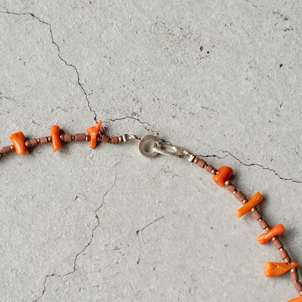 Melanie DeCourcey Beaded necklace -antique natural coral, African terracotta beads with tiny copper detail