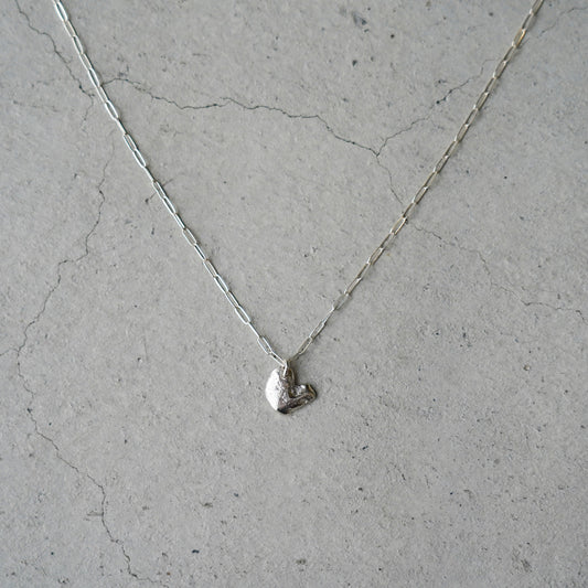 Melanie Decourcey Silver necklace with Freestyle silver heart pendant