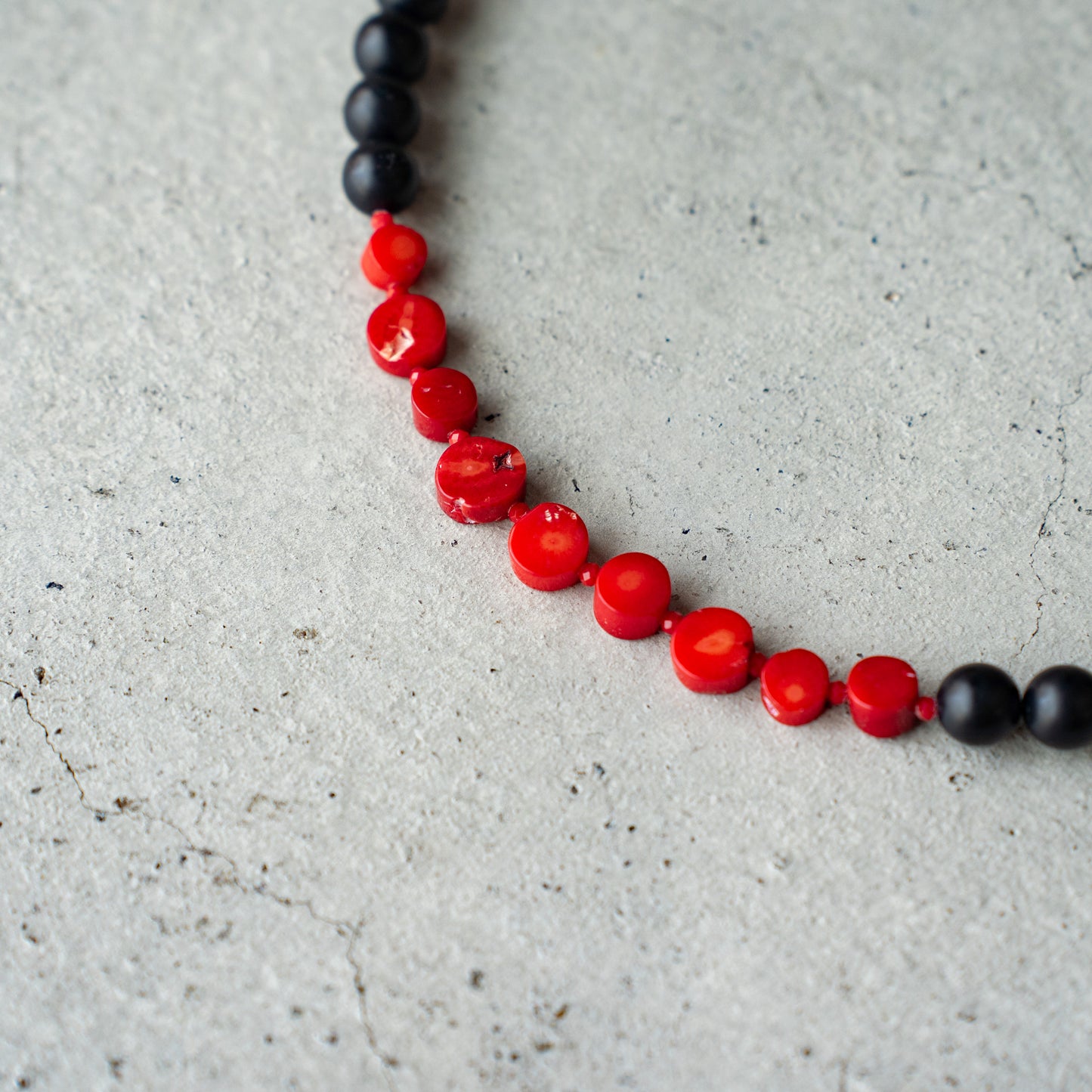 Melanie DeCourcey Matt onyx with dyed coral