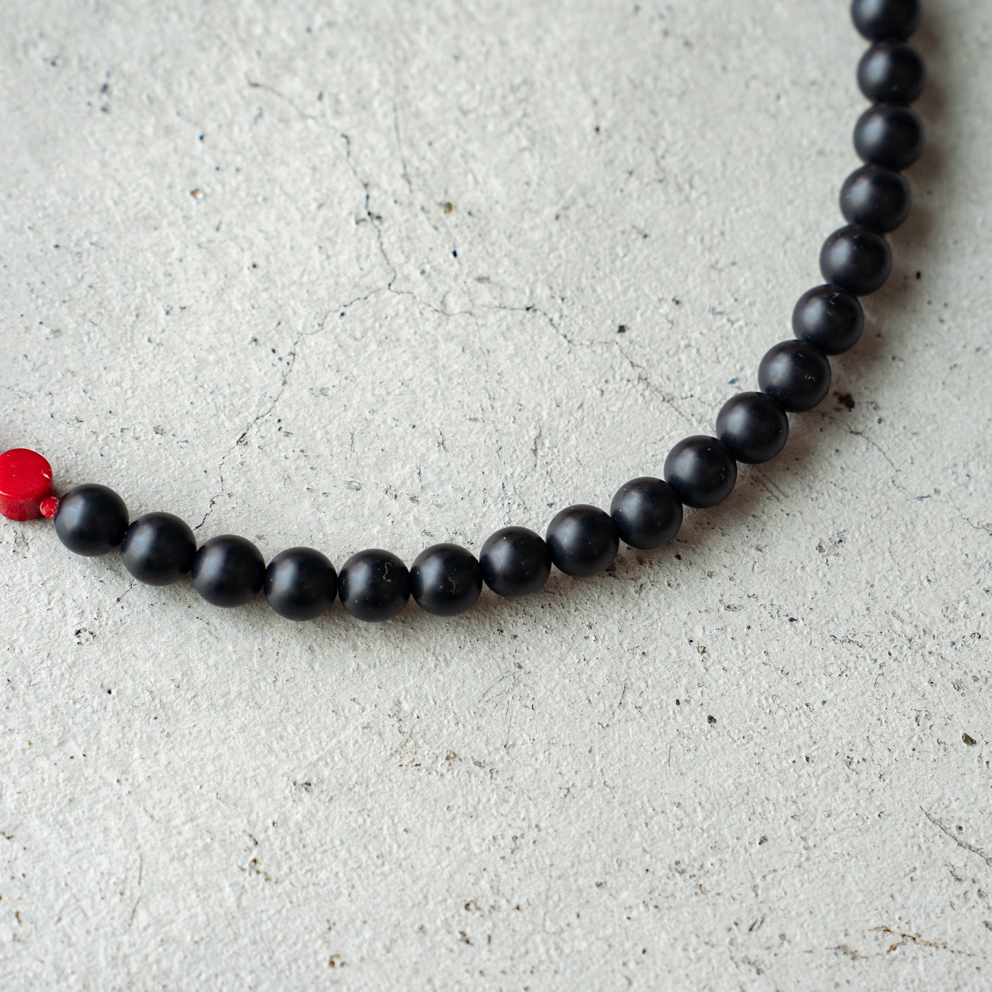 Melanie DeCourcey Matt onyx with dyed coral