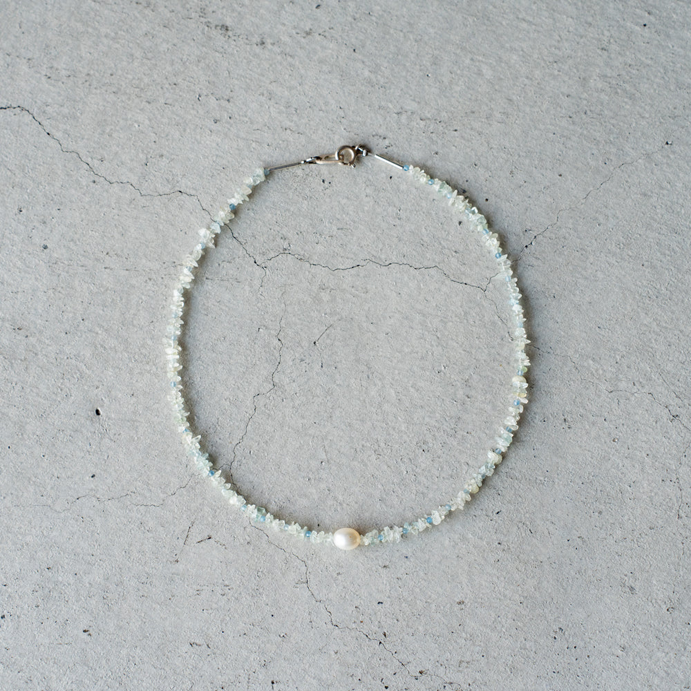 Melanie Decourcey Aquamarine beads with pearl center
