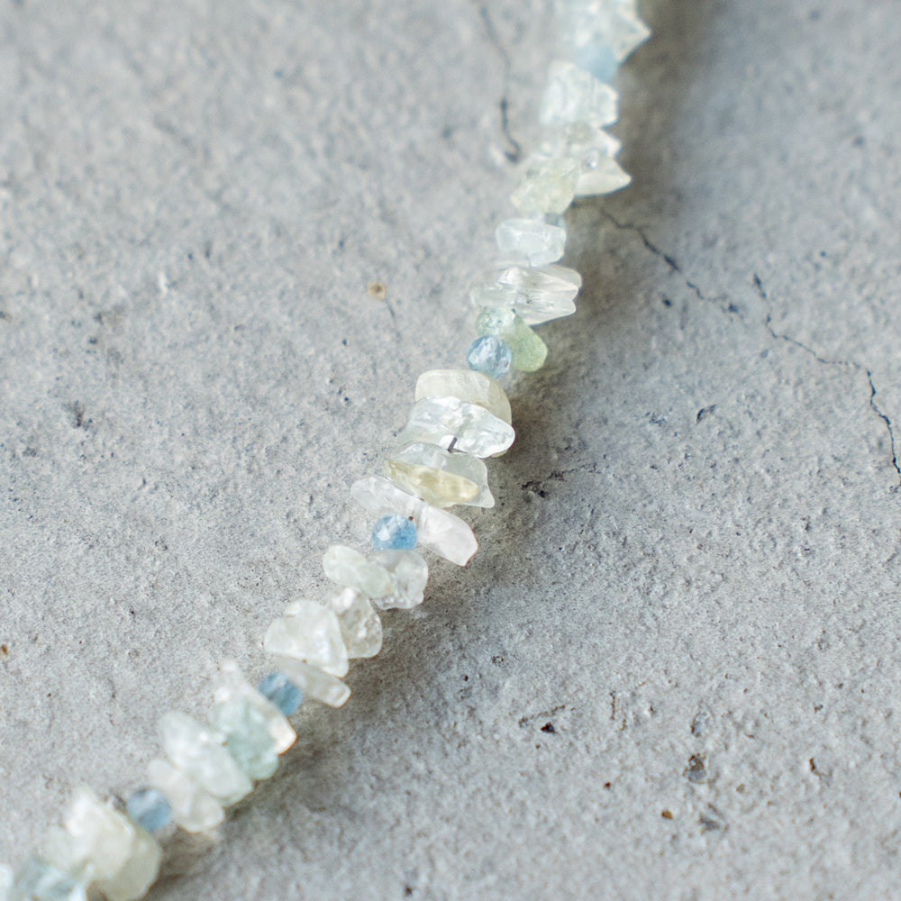 Melanie Decourcey Aquamarine beads with pearl center