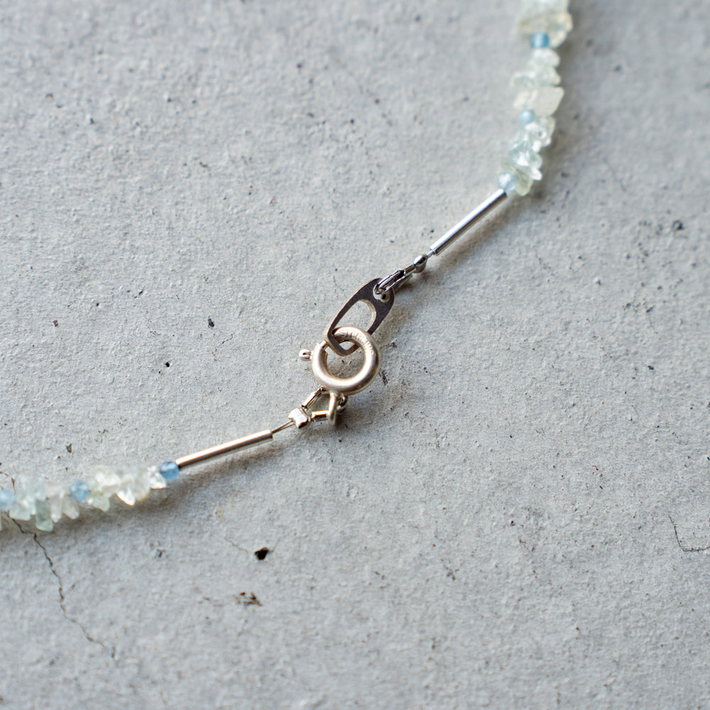 Melanie Decourcey Aquamarine beads with pearl center