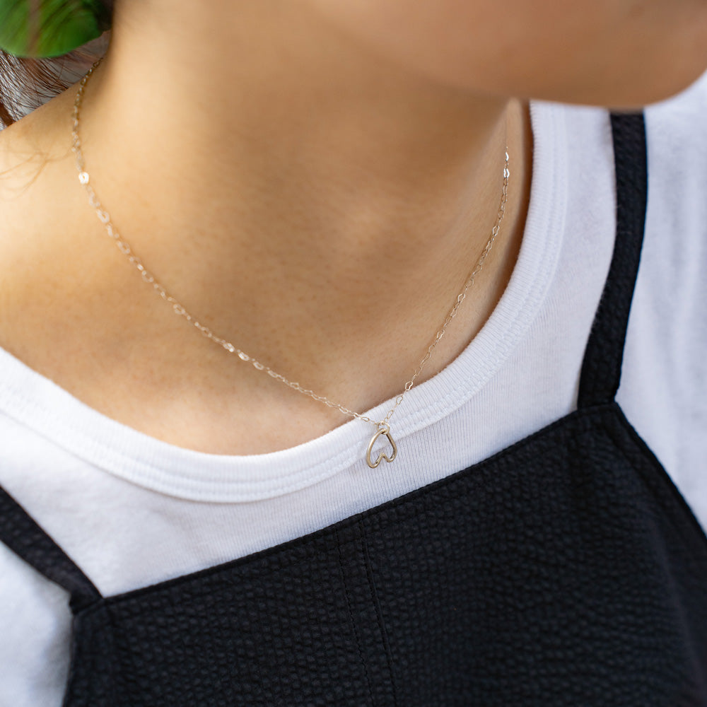 Melanie DeCourcey Heart shaped silver chain with freestyle pendant