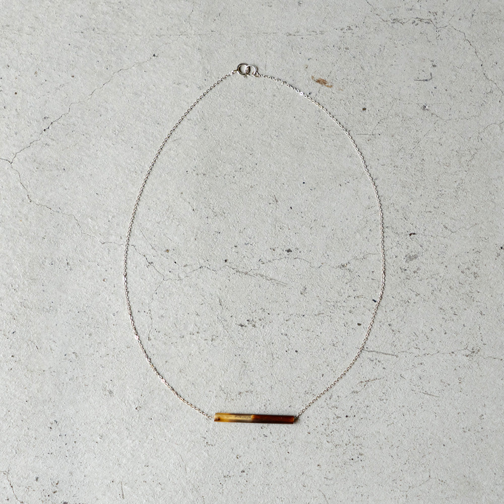 Melanie DeCourcey France antique tortoise tube on silver chain