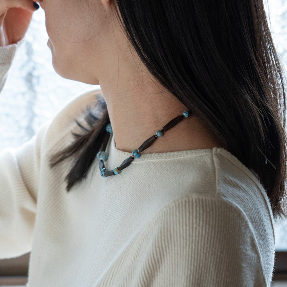 Melanie Decourcey Ebony wood with blue vintage ceramic beads snd small onyx