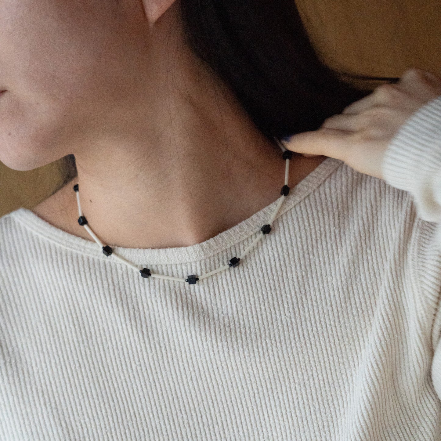 Melanie Decourcey Ivory color glass tubes alternating with onyx cube