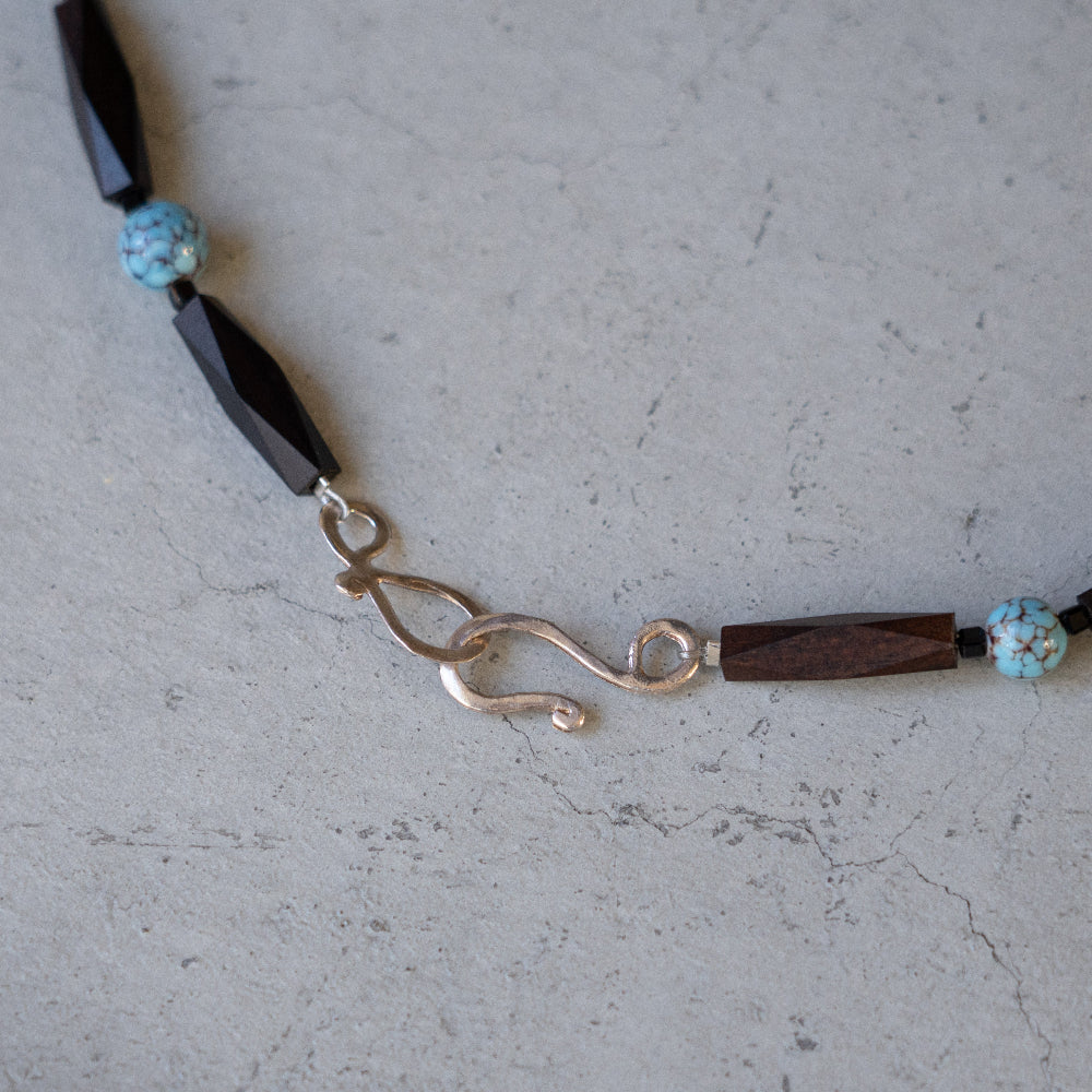Melanie Decourcey Ebony wood with blue vintage ceramic beads snd small onyx