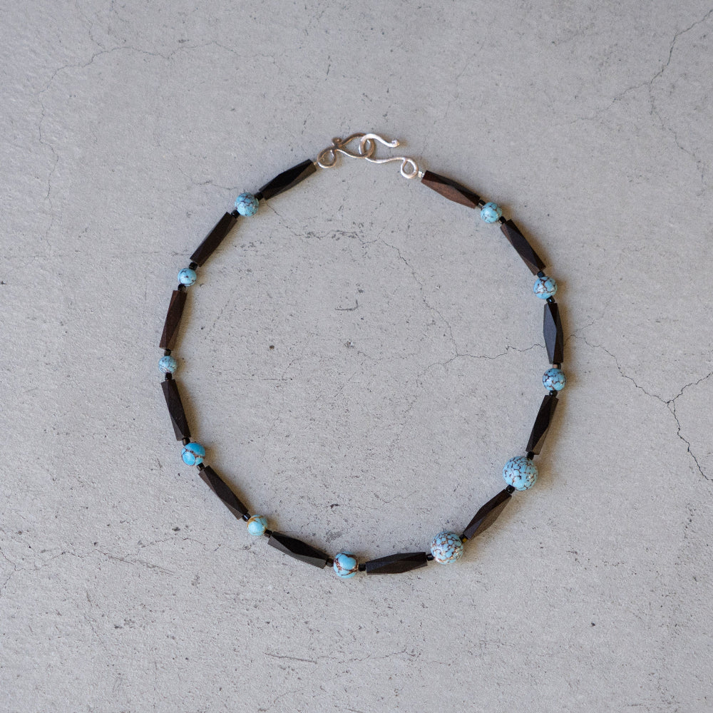 Melanie Decourcey Ebony wood with blue vintage ceramic beads snd small onyx