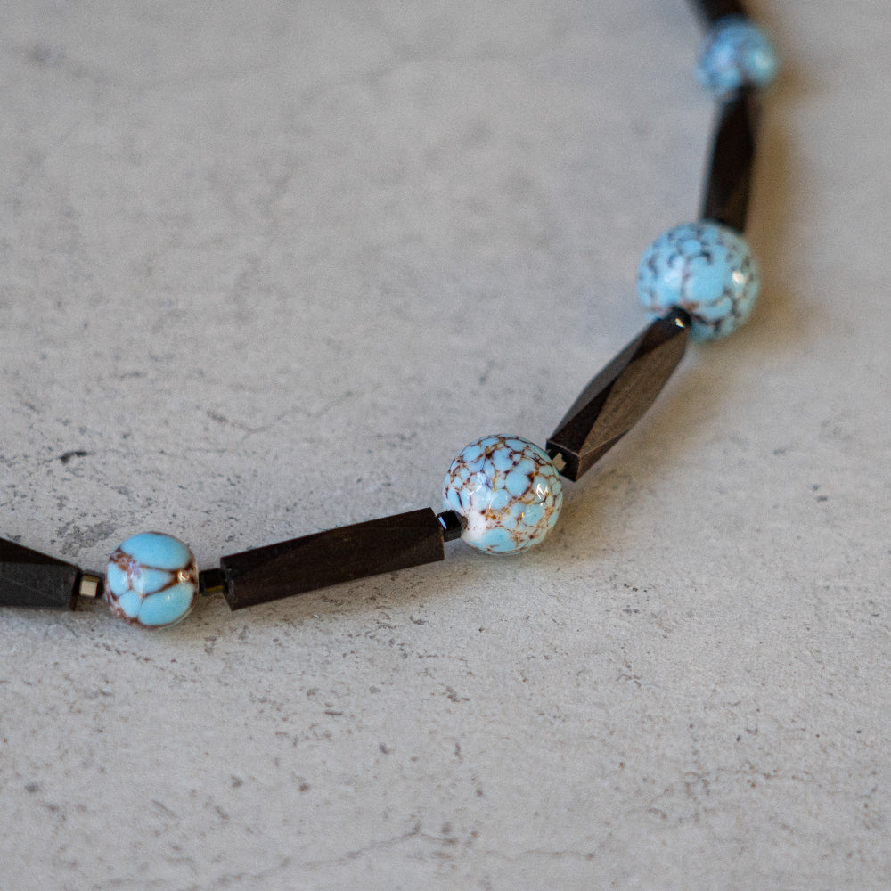 Melanie Decourcey Ebony wood with blue vintage ceramic beads snd small onyx
