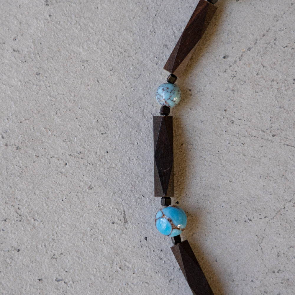 Melanie Decourcey Ebony wood with blue vintage ceramic beads snd small onyx