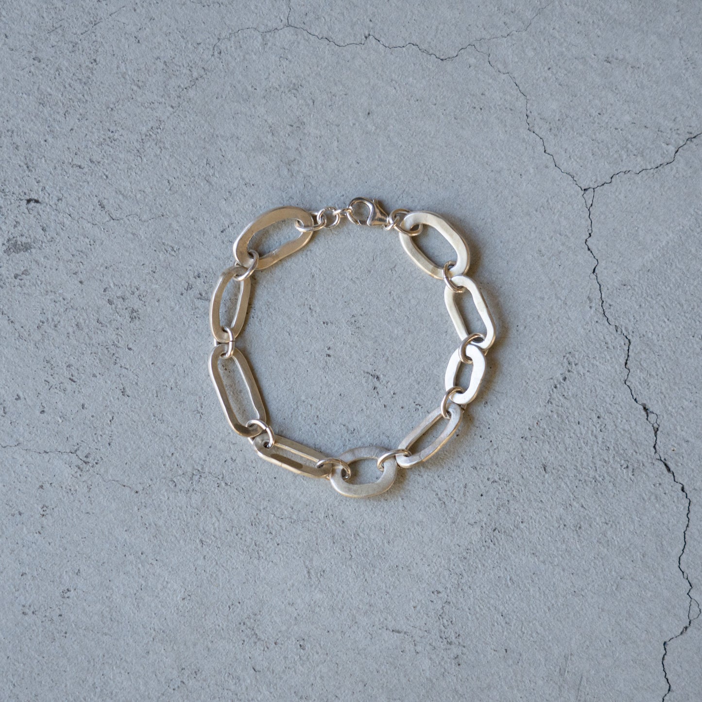 Melanie Decourcey One of a kind freestyle open silver circle bracelet