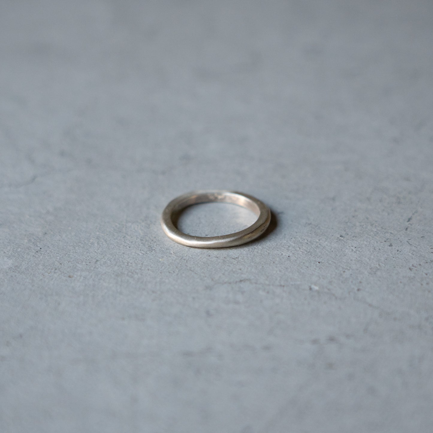 Melanie Decourcey Thin flat freestyle silver ring