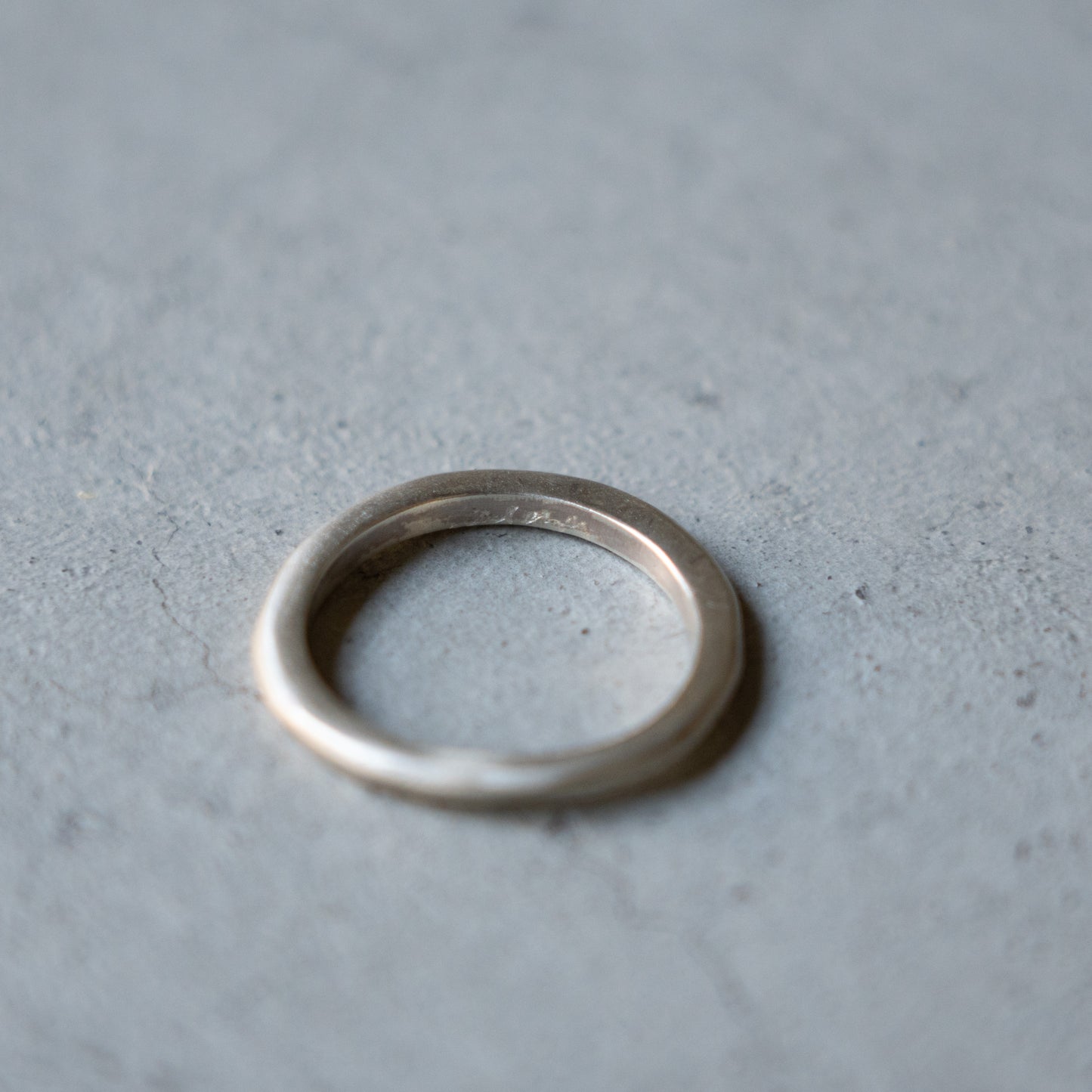 Melanie Decourcey Thin flat freestyle silver ring