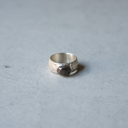 Melanie Decourcey  Textured silver ring with oxidized silver dome