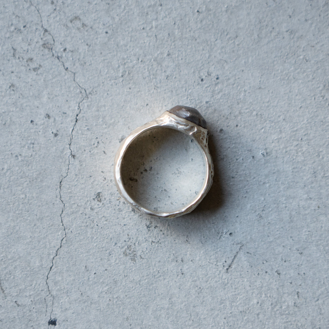 Melanie Decourcey Textured silver ring with oxidized silver dome
