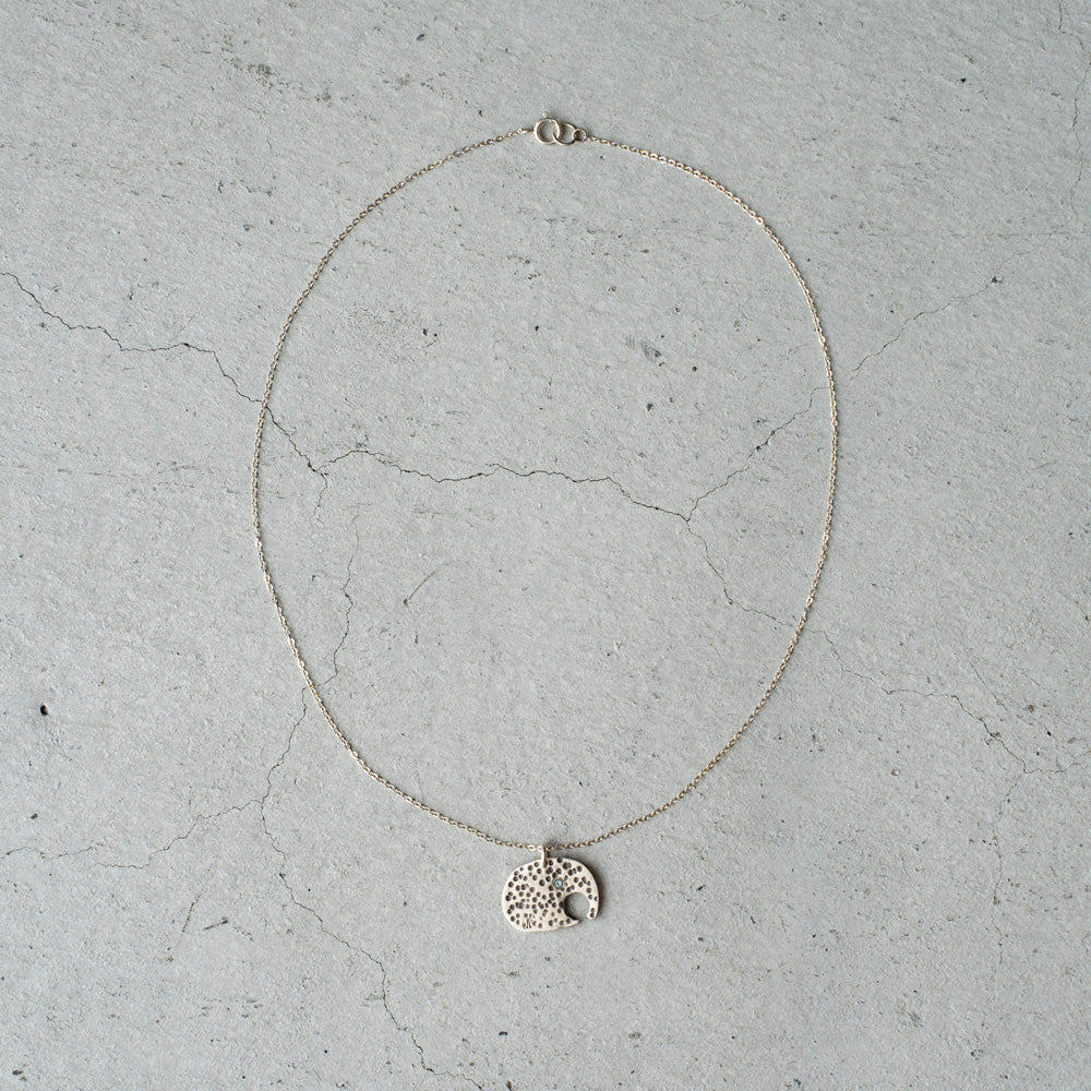 Melanie DeCourcey Elephant with small aquamarine on silver chain