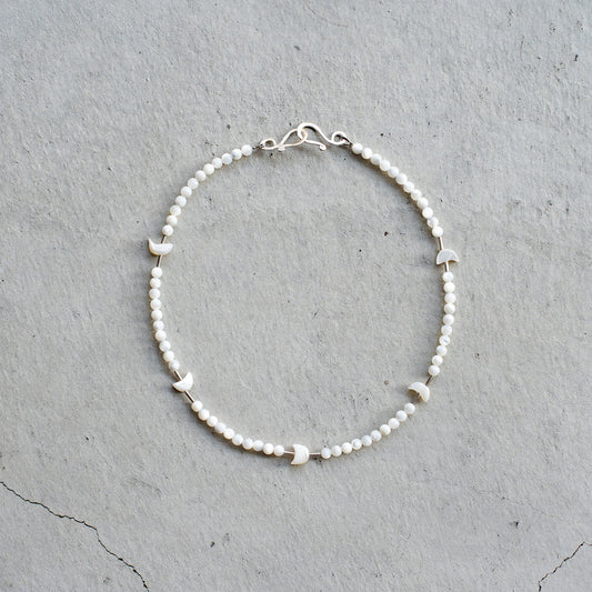 Melanie DeCourcey   Mother of pearl with silver tubes and mother of pearl moon shape