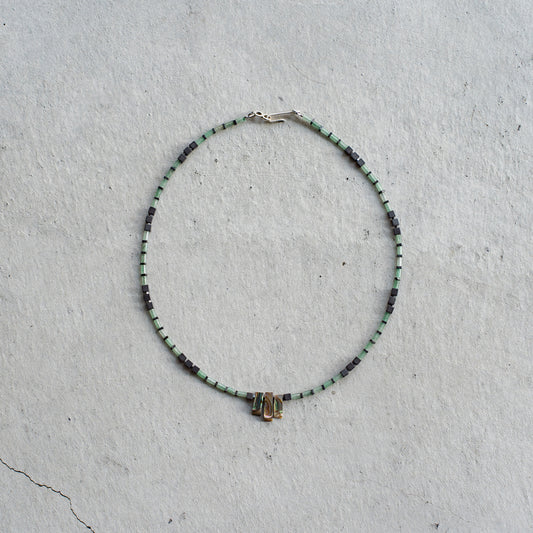 Melanie DeCourcey   Aventurine alternating with hematite and Abalone shell cennter
