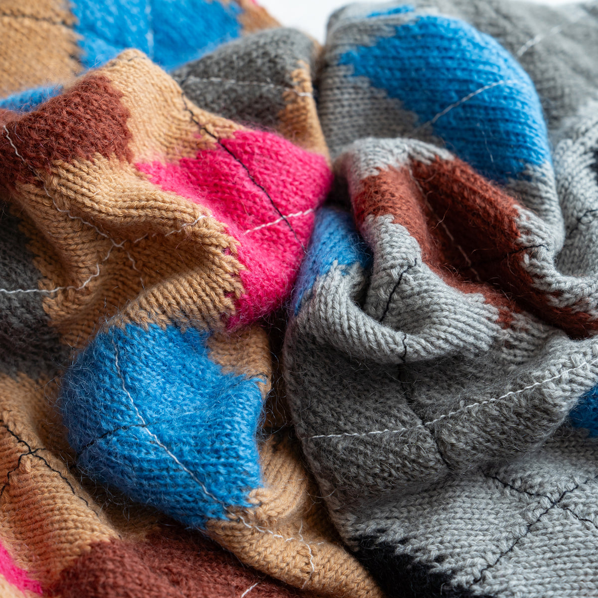 COOHEM　STITCHED ARGYLE KNIT PULLOVER