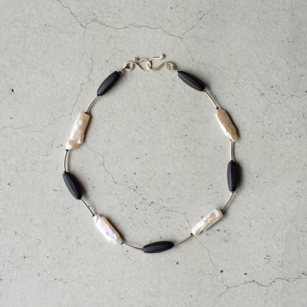 Melanie DeCourcey   Black mother of pearl, Czech glass beads, black spinel