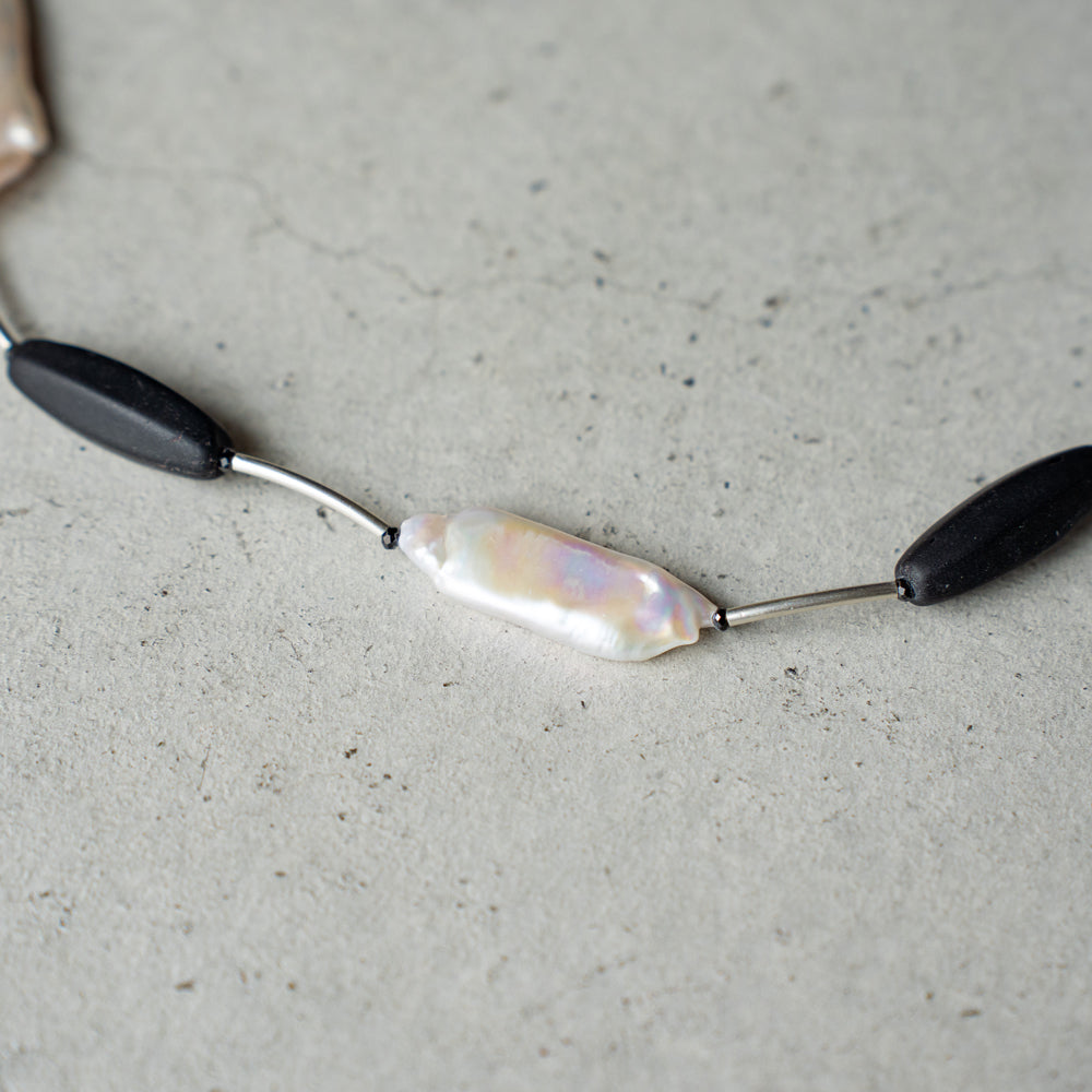 Melanie DeCourcey   Black mother of pearl, Czech glass beads, black spinel