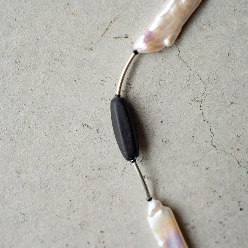 Melanie DeCourcey   Black mother of pearl, Czech glass beads, black spinel
