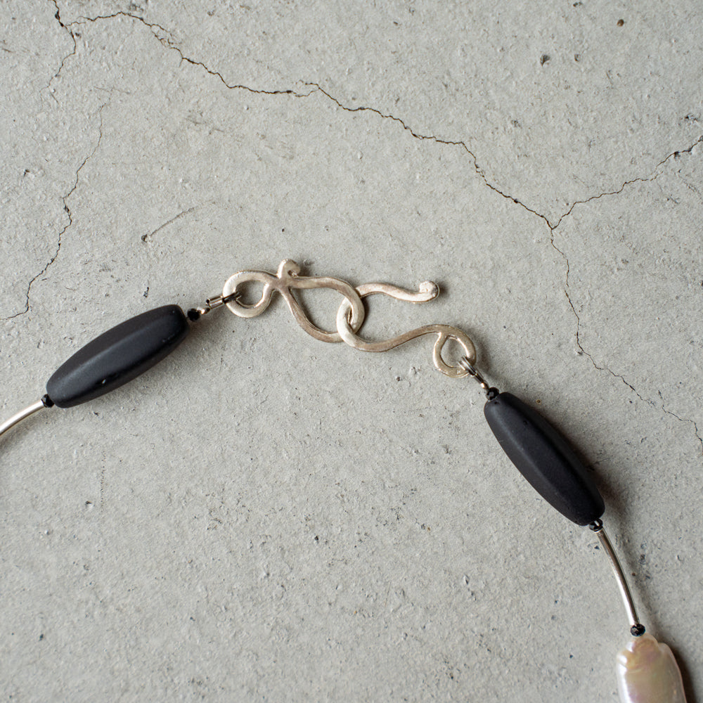 Melanie DeCourcey   Black mother of pearl, Czech glass beads, black spinel