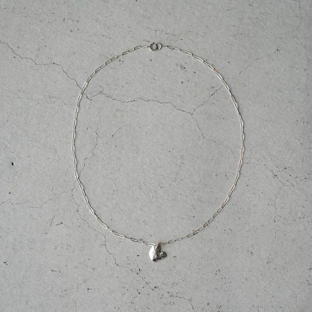 Melanie Decourcey Silver necklace with Freestyle silver heart pendant