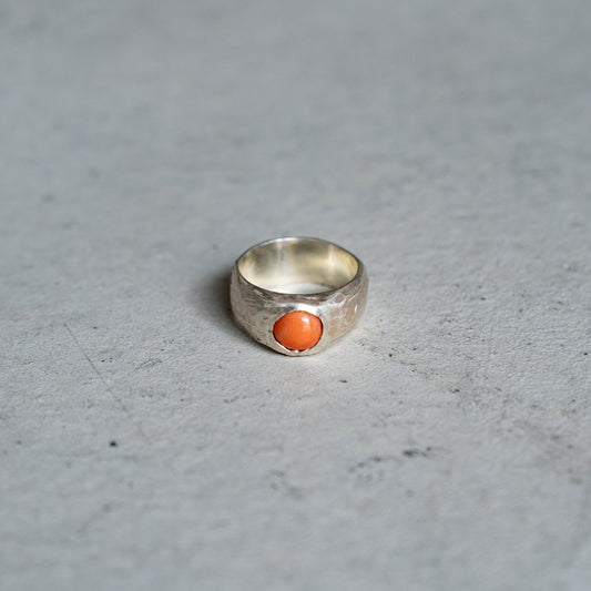 Melanie Decourcey  Textured silver ring with round coral