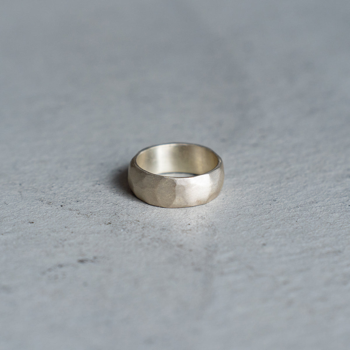 Melanie Decourcey  Silver ring with silver facet detail