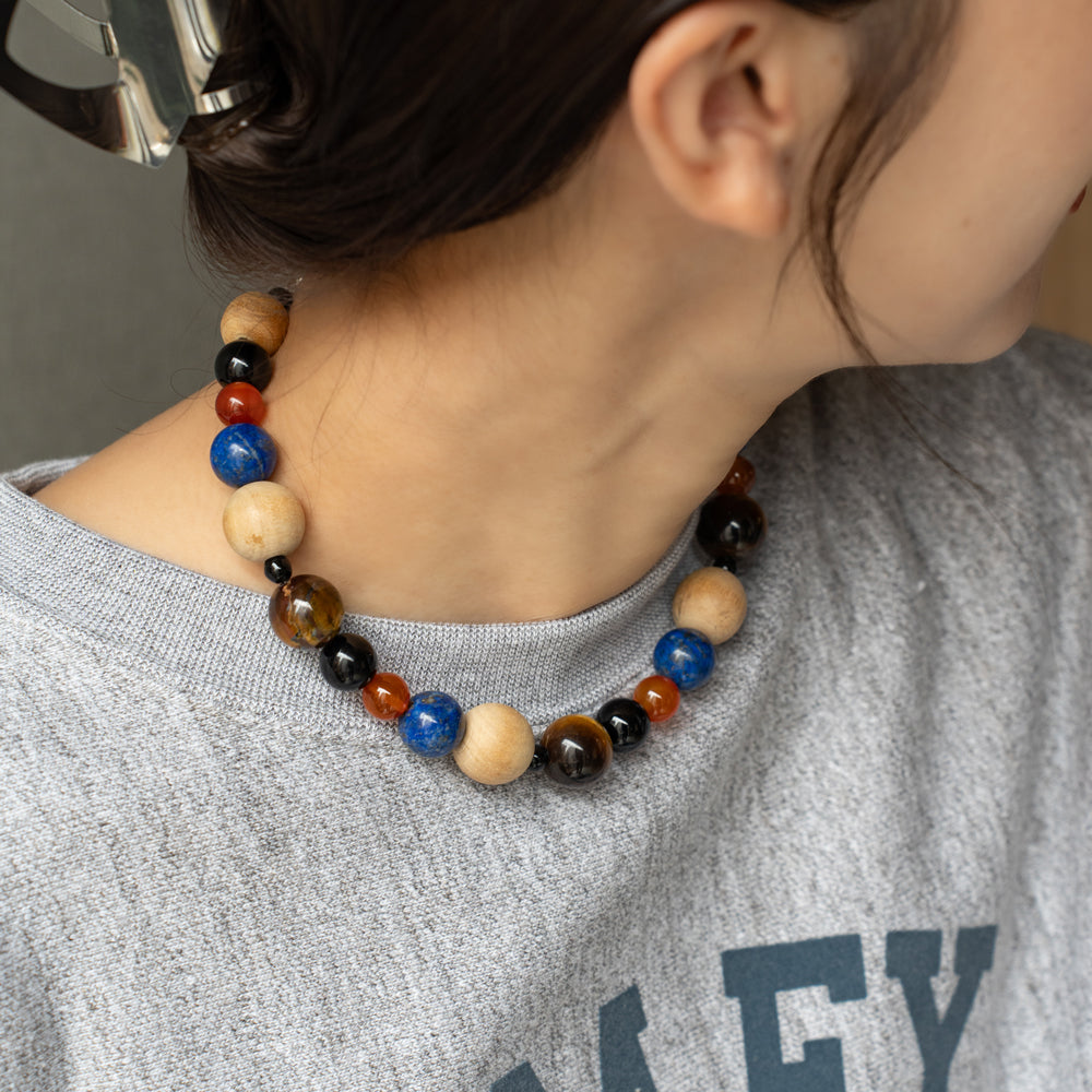 Melanie DeCourcey   Wood, lapis lazuli, carnelian agate, onyx and tiger eye necklace