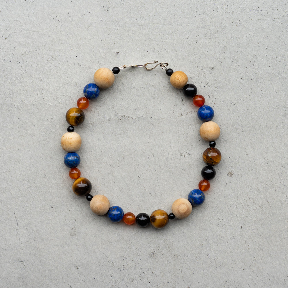 Melanie DeCourcey   Wood, lapis lazuli, carnelian agate, onyx and tiger eye necklace