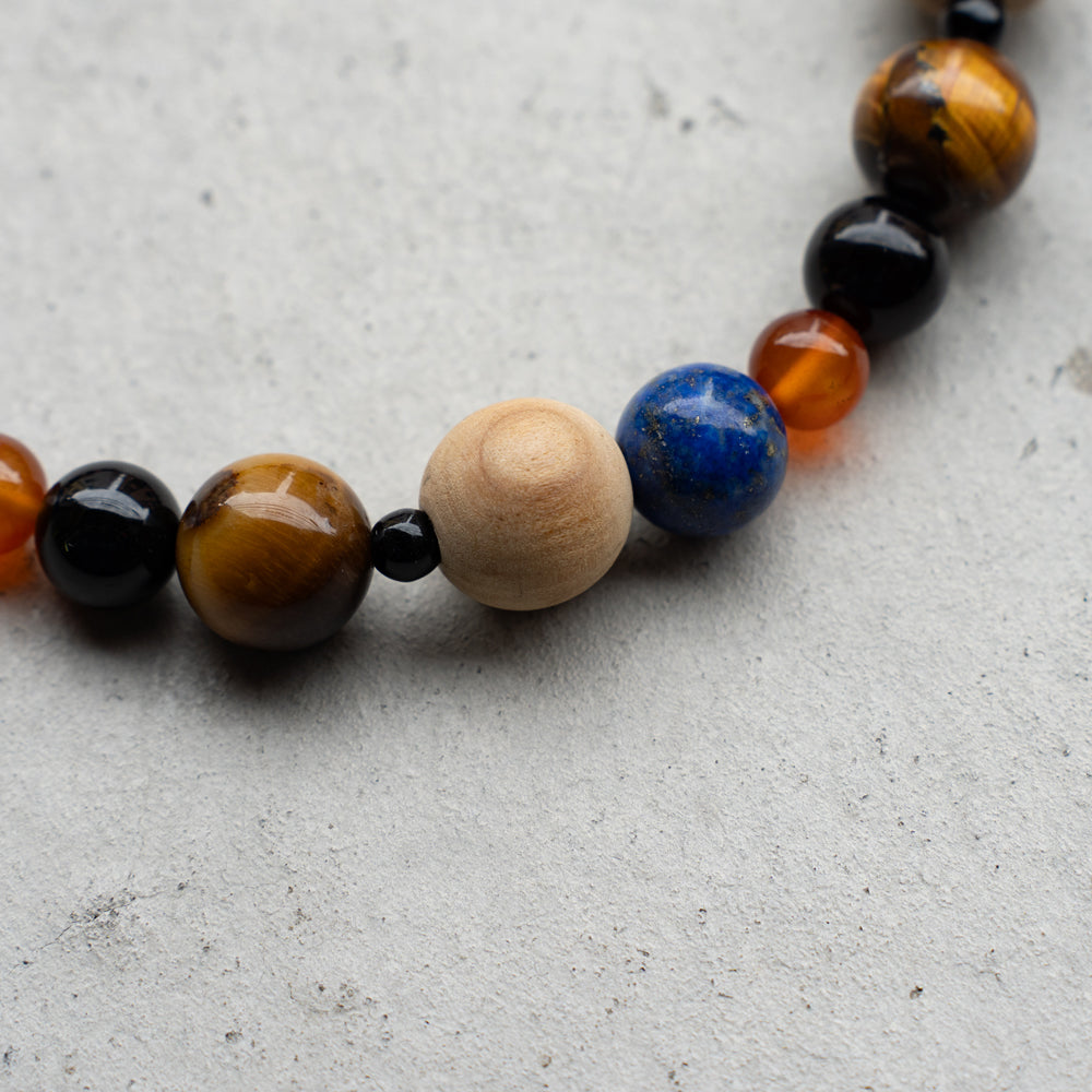 Melanie DeCourcey   Wood, lapis lazuli, carnelian agate, onyx and tiger eye necklace