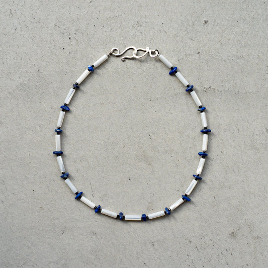 Melanie DeCourcey   White mother of pearl with black tourmaline and lapis lazuli necklace