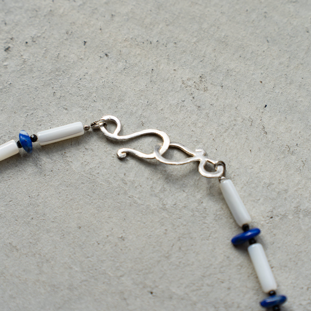 Melanie DeCourcey   White mother of pearl with black tourmaline and lapis lazuli necklace