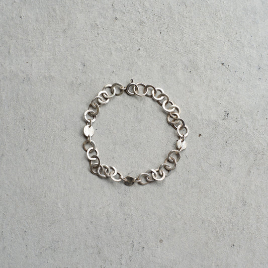 Melanie Decourcey  Open and full silver circle bracelet