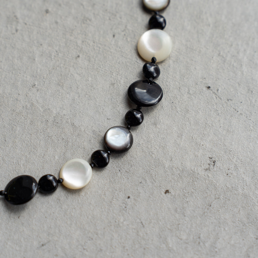 Melanie DeCourcey   Black and white mother of pearl, onyx and spinel necklace