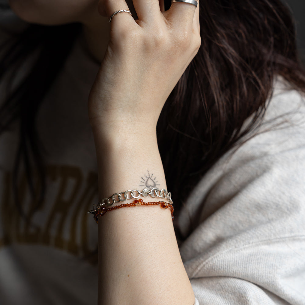 Melanie Decourcey  Open and full silver circle bracelet