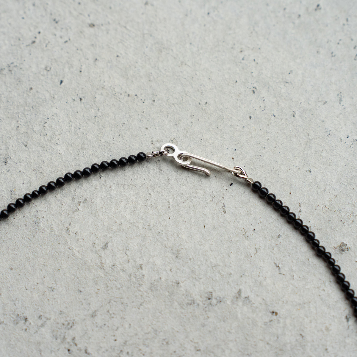 Melanie DeCourcey   Small onyx with mother of pearl moon
