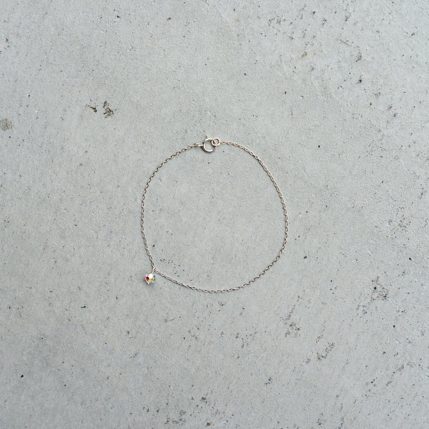 Melanie DeCourcey Silver chain with floating with Chrystal