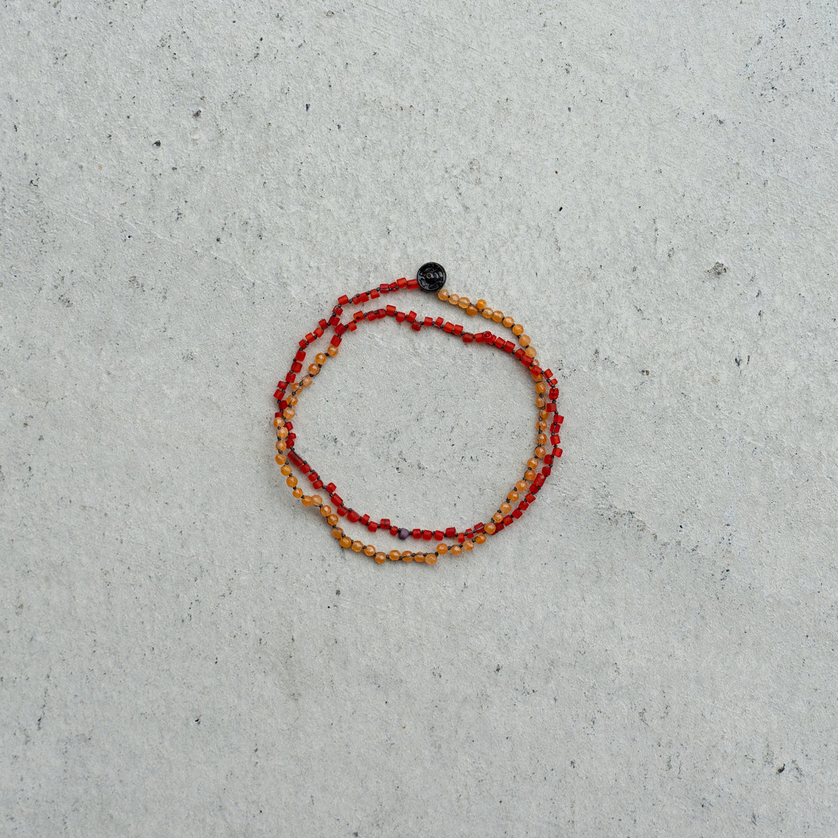 Melanie DeCourcey  Aventurine and Pakistan red glass beads DNA double bracelet